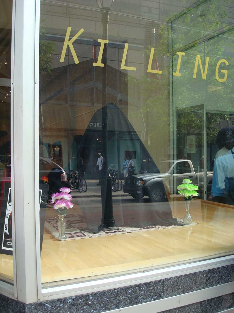 Draped art in the front window of the Art Institute’s “Killing Time” show, June 2008